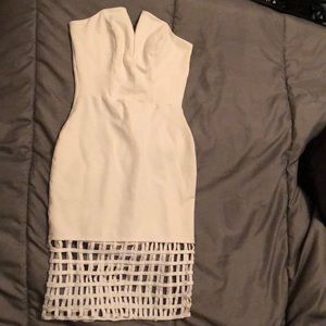 All white, body-con dress with box pattern at trim